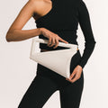 Model wearing NOIRANCA handbag Althea in Ivory