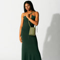 Model wearing NOIRANCA handbag Debbie in Olive Green with a strap