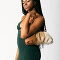 Model wearing NOIRANCA handbag Patti in Brown with its thick matt chain