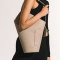 Model wearing NOIRANCA handbag Georgia in Clay Beige