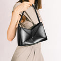 Model wearing NOIRANCA handbag Miriam in Black